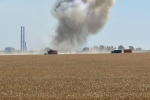 Impact of a bomb close to his plot